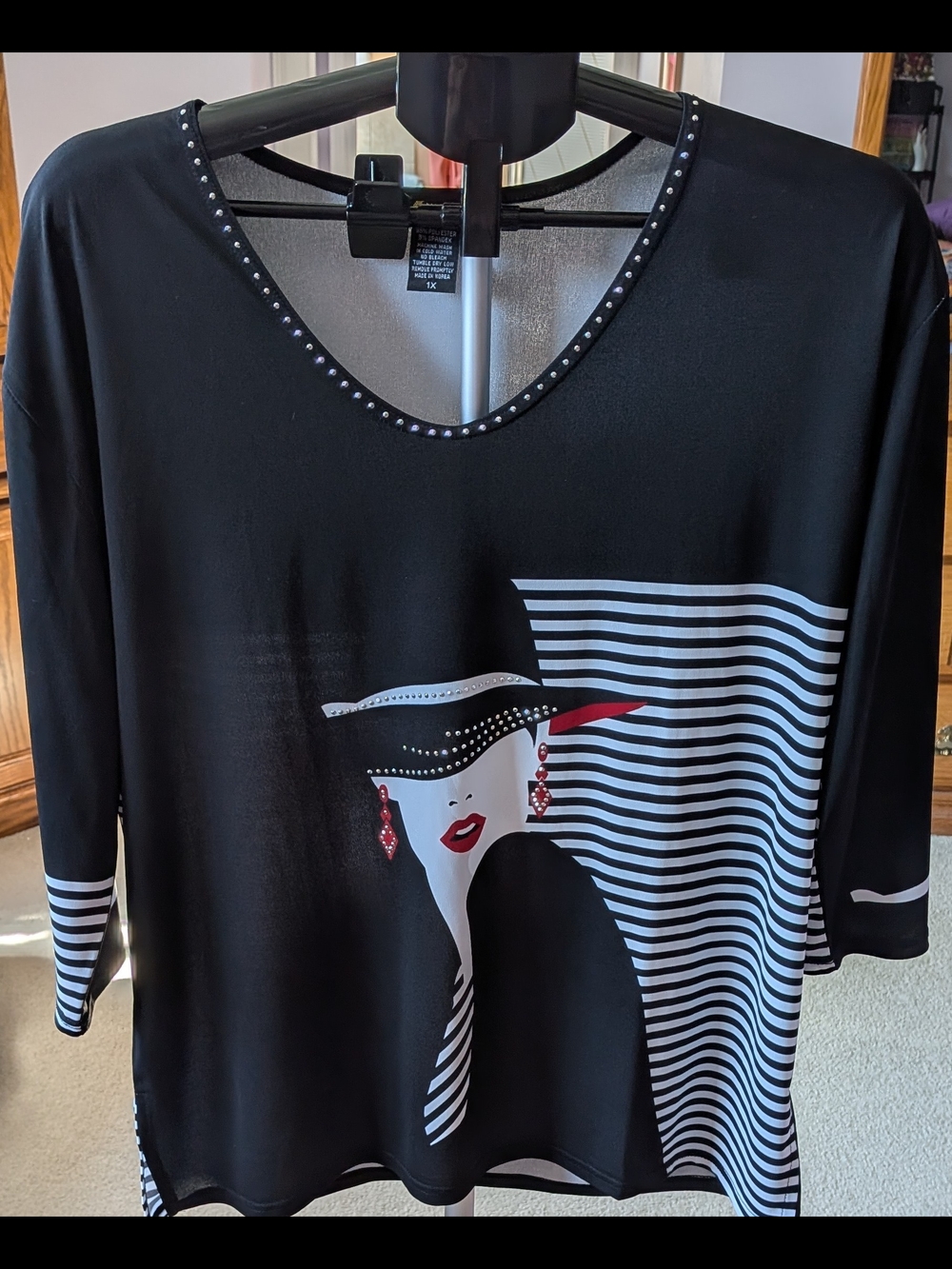 Valentina Black Long Sleeve Tee with White Stripes and Red Accents Female Face
